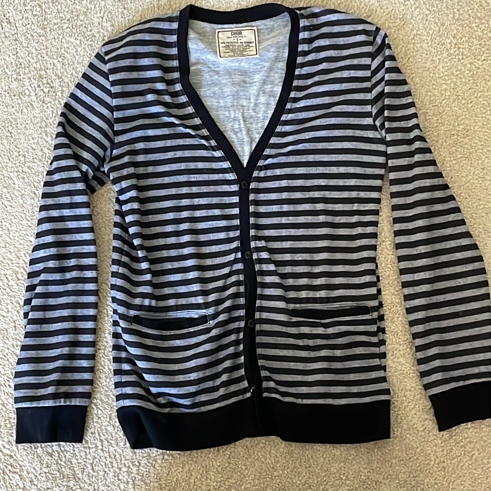 Navy blue striped cardigan with front pockets and buttons
